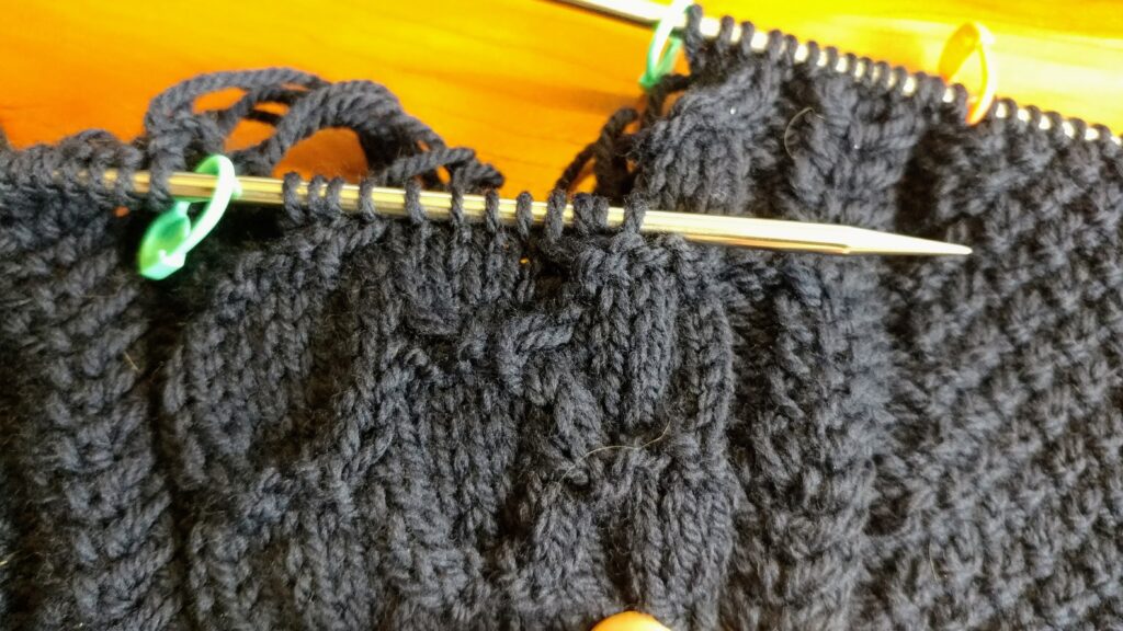 knitted cables with fix in progress